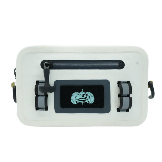A sea shell colored waterproof sling bag with black straps and a Toadfish logo on the front. It has exterior latch loops and a Velcro fly patch.