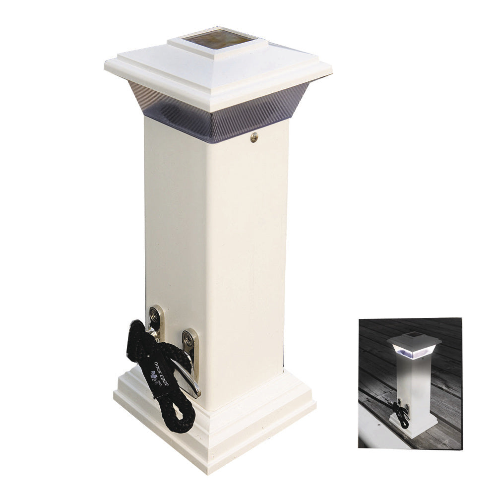 A white, colonial-style vinyl pillar with a stainless steel mooring cleat and solar dock light on top.